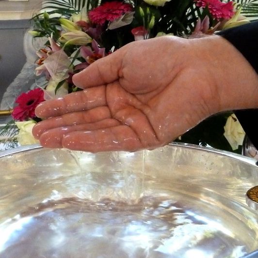 Taufe; Foto: Gemeinde/LF